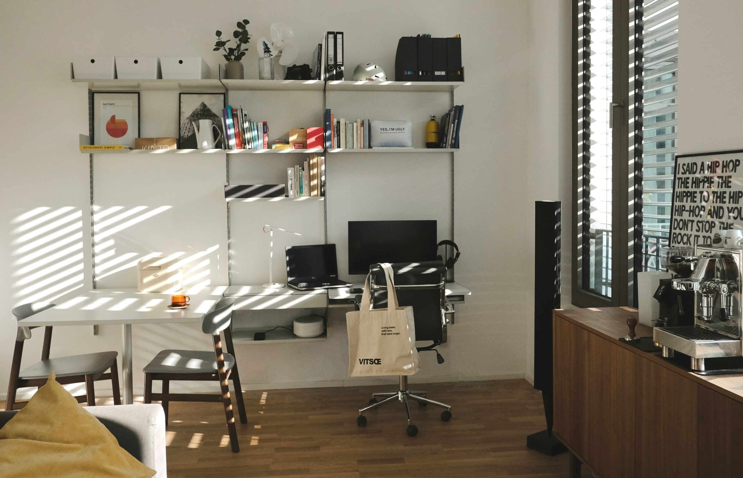A clean office space with workers using VoIP headsets for improved productivity
