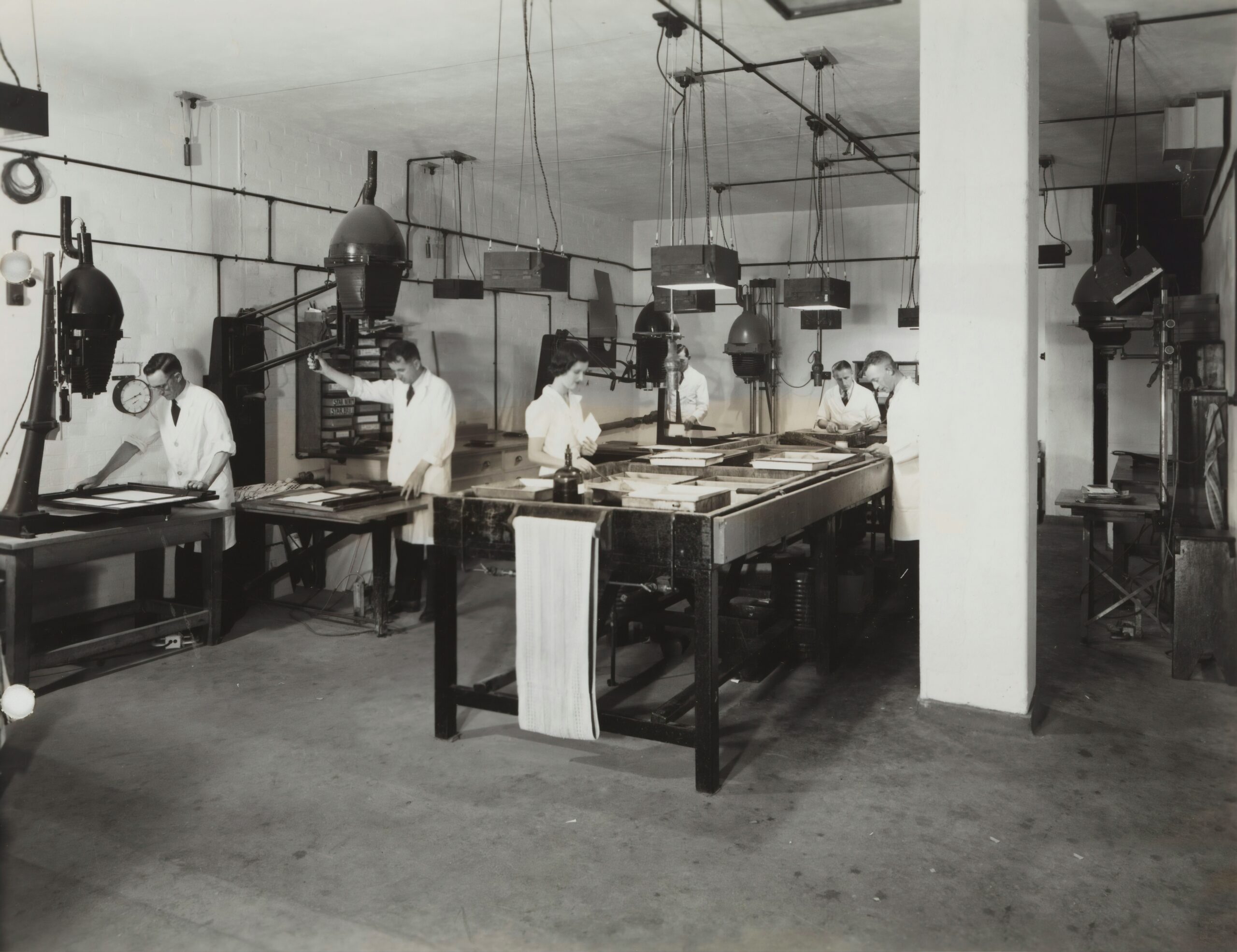 Employees at a workshop learning how to use VoIP phone systems