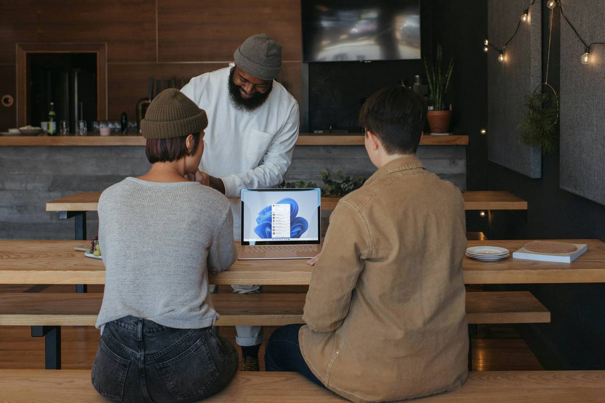 Image of a manager training employees on new video call features