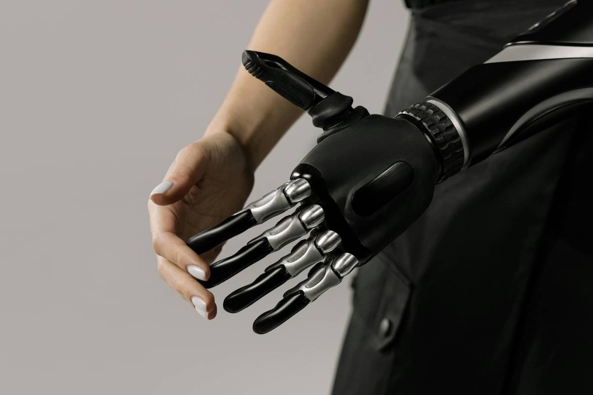 An image showing a cluttered desk with an old-school phone surrounded by papers, illustrating inefficiency